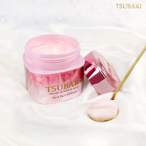 Восстанавливающая маска для волос премиум с ароматом камелии Shiseido TSUBAKI Premium Repair Mask Pink Version 180g 4550516711106 фото